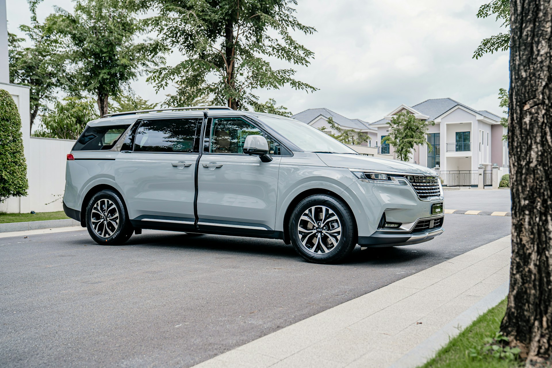 black and brown leather padded tub sofa