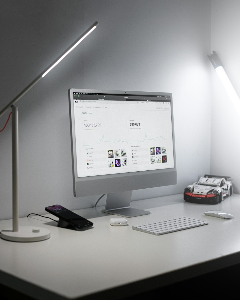 a desktop computer sitting on top of a white desk