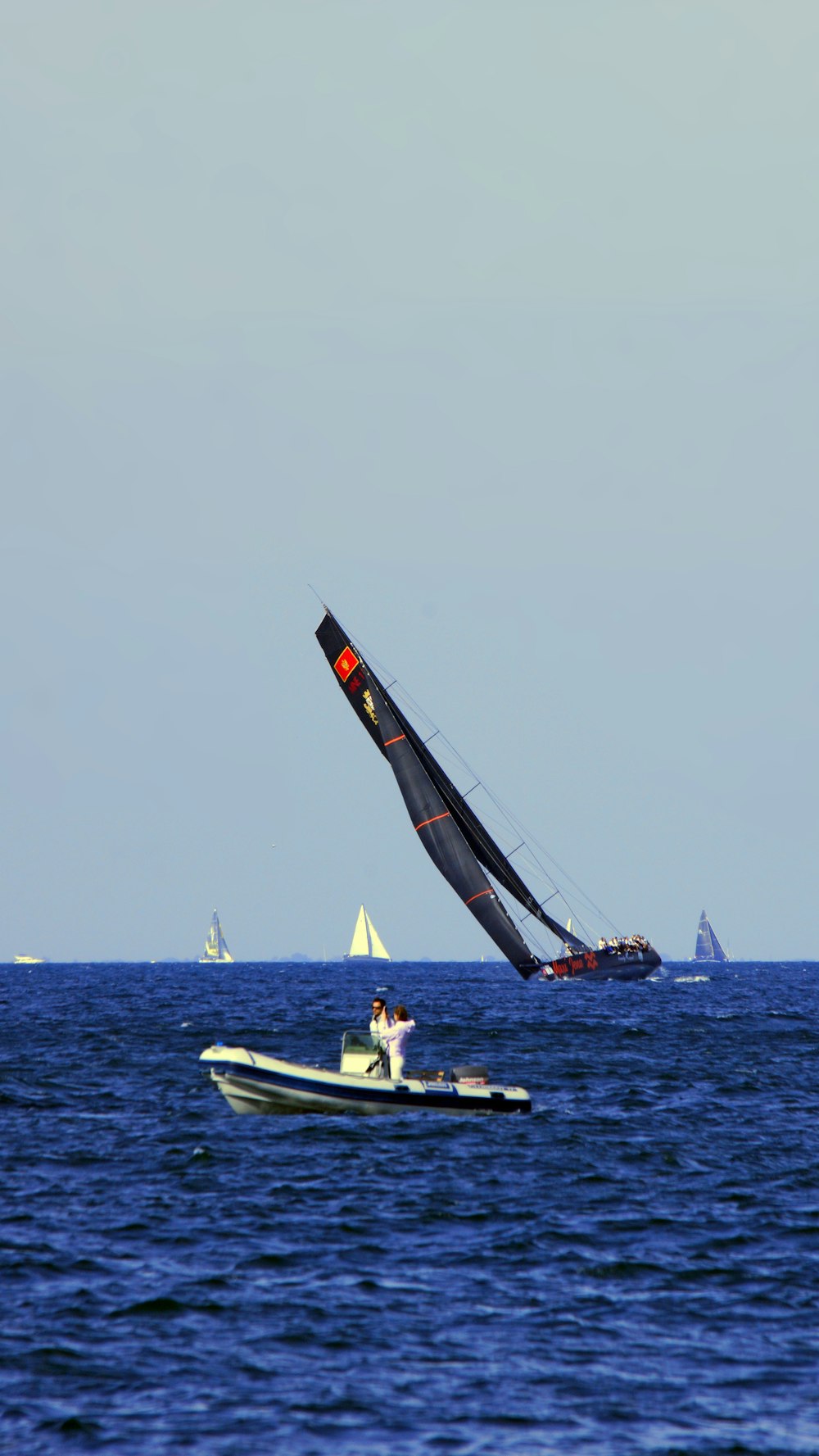 a person riding a boat on top of a body of water