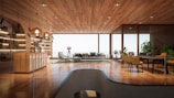 Interior shot showcasing warm oak accents and spacious minimalist living area.