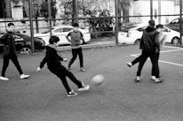 a group of young men playing a game of soccer
