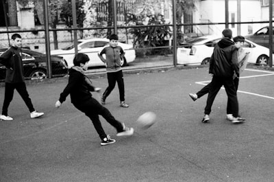 a group of young men playing a game of soccer