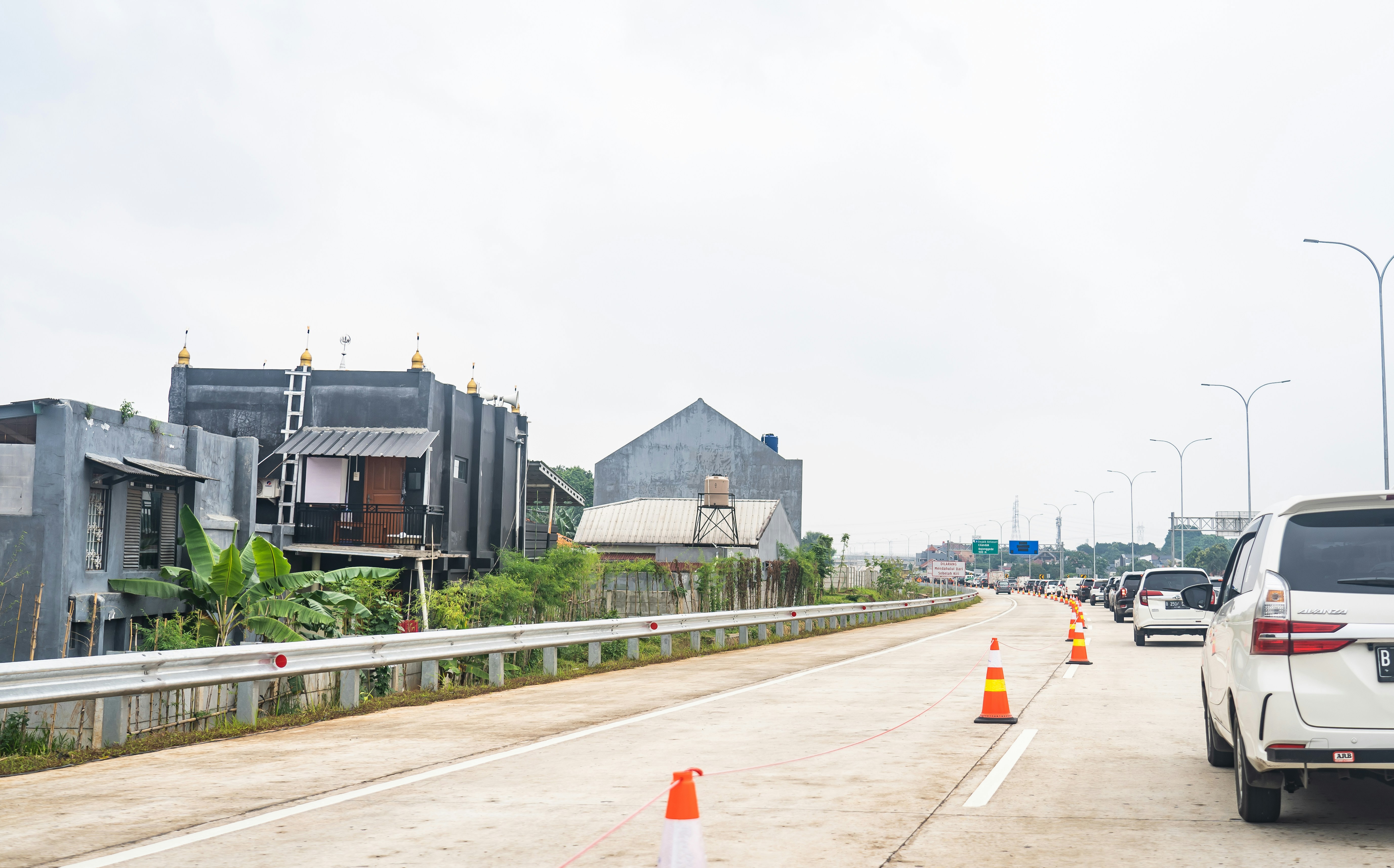 a couple of cars that are sitting in the street