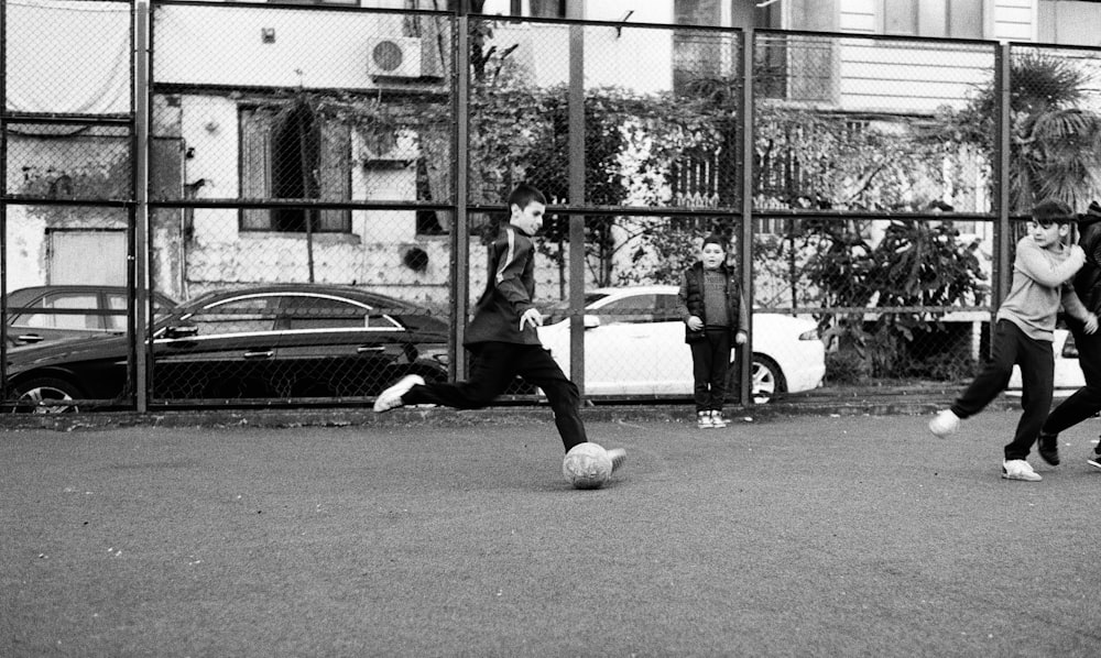 a group of people playing a game of soccer