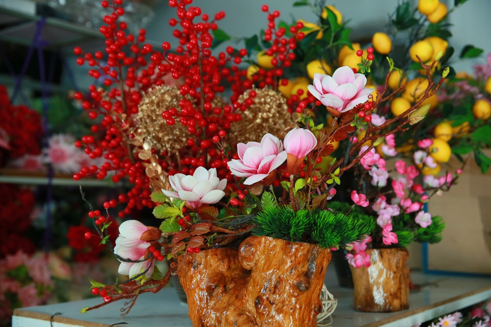 a bunch of flowers that are sitting on a table