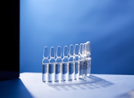 a row of test tubes sitting on top of a table