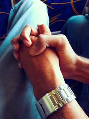 A close-up of hands shaking to symbolize partnership.