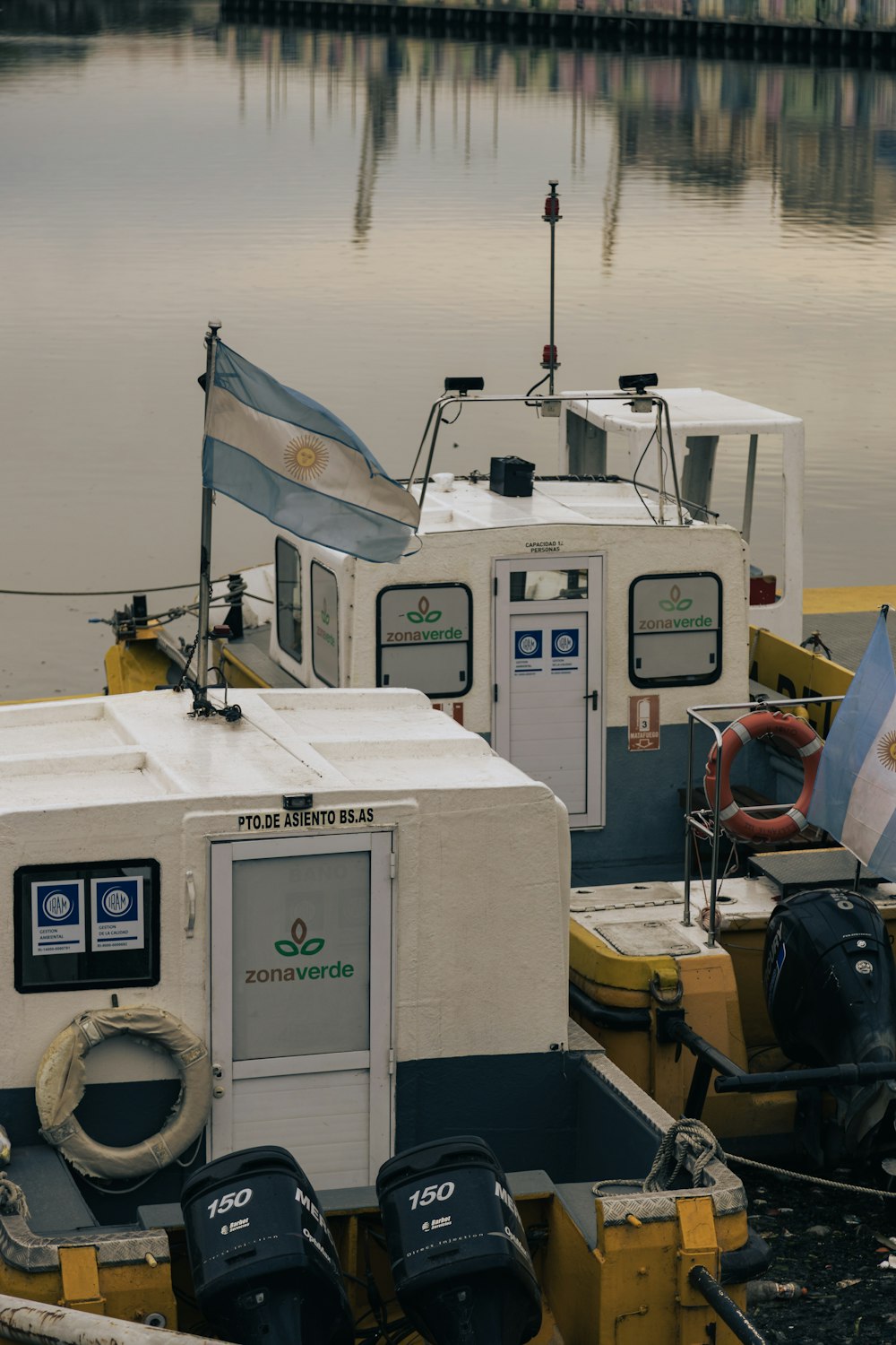 a couple of boats that are sitting in the water