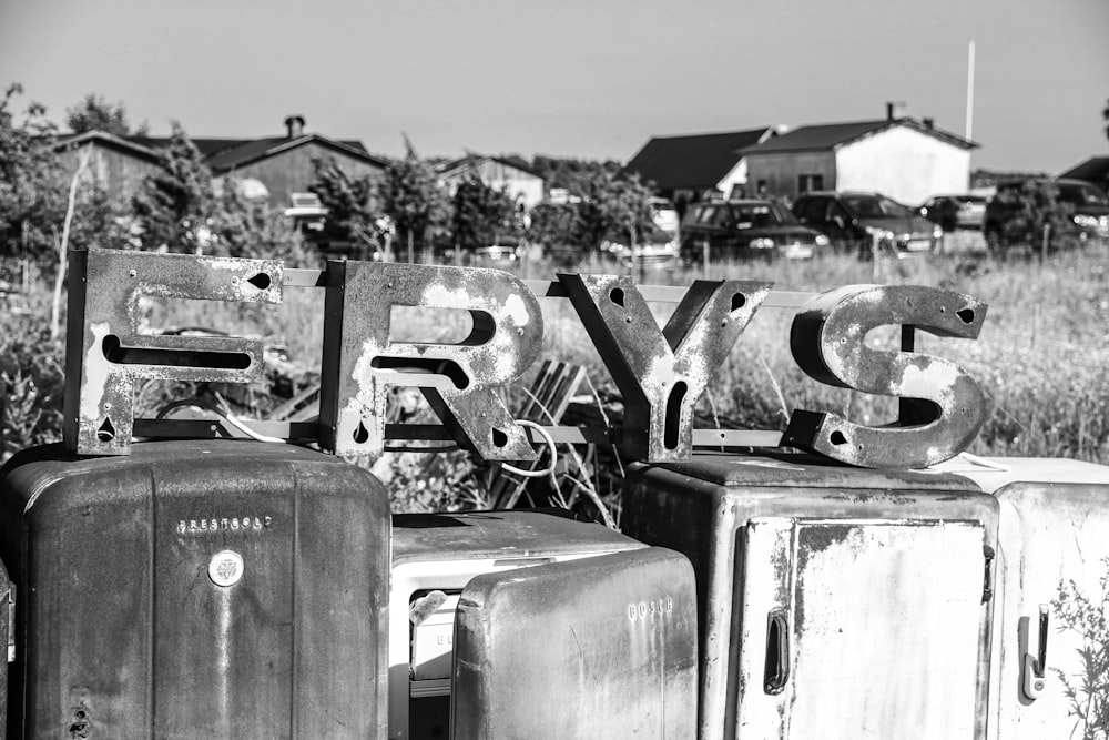 a black and white photo of some old suitcases