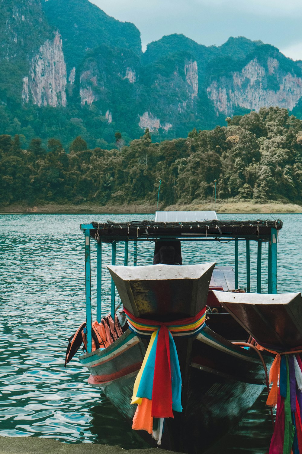 a couple of boats that are sitting in the water