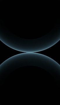 A minimalist logo featuring smooth, flowing lines in cool blue tones on a white background.