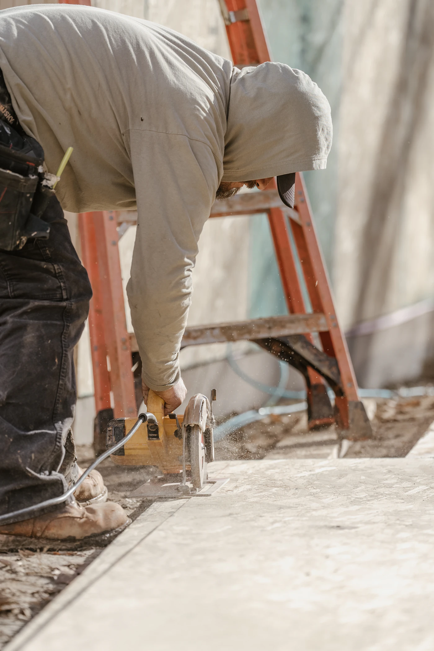 Natural stone slab being set into a terrace base