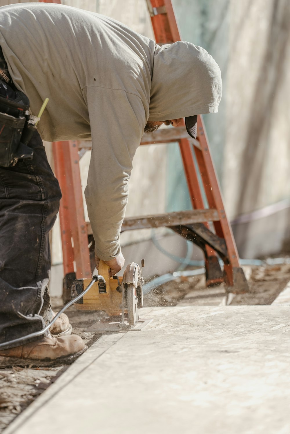 a man working on a piece of wood