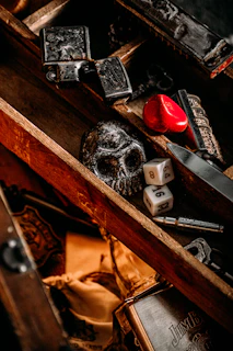 A beautifully carved wooden box filled with rare collectible trinkets and relics.