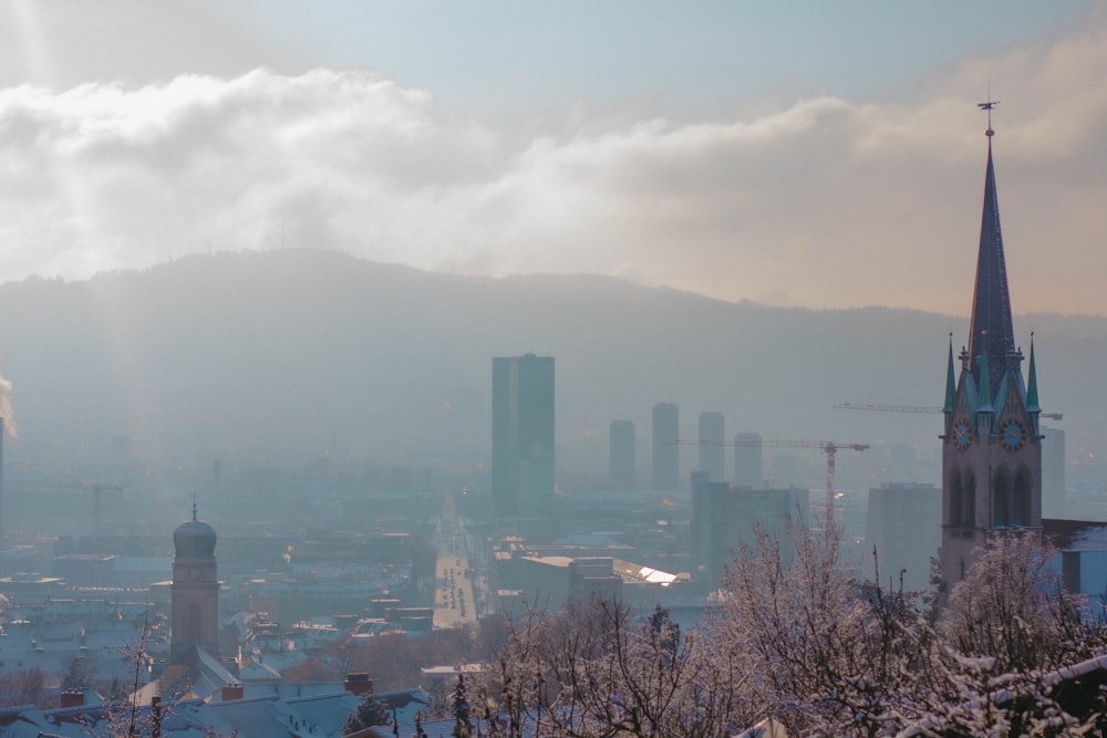 a view of a city with tall buildings in the background