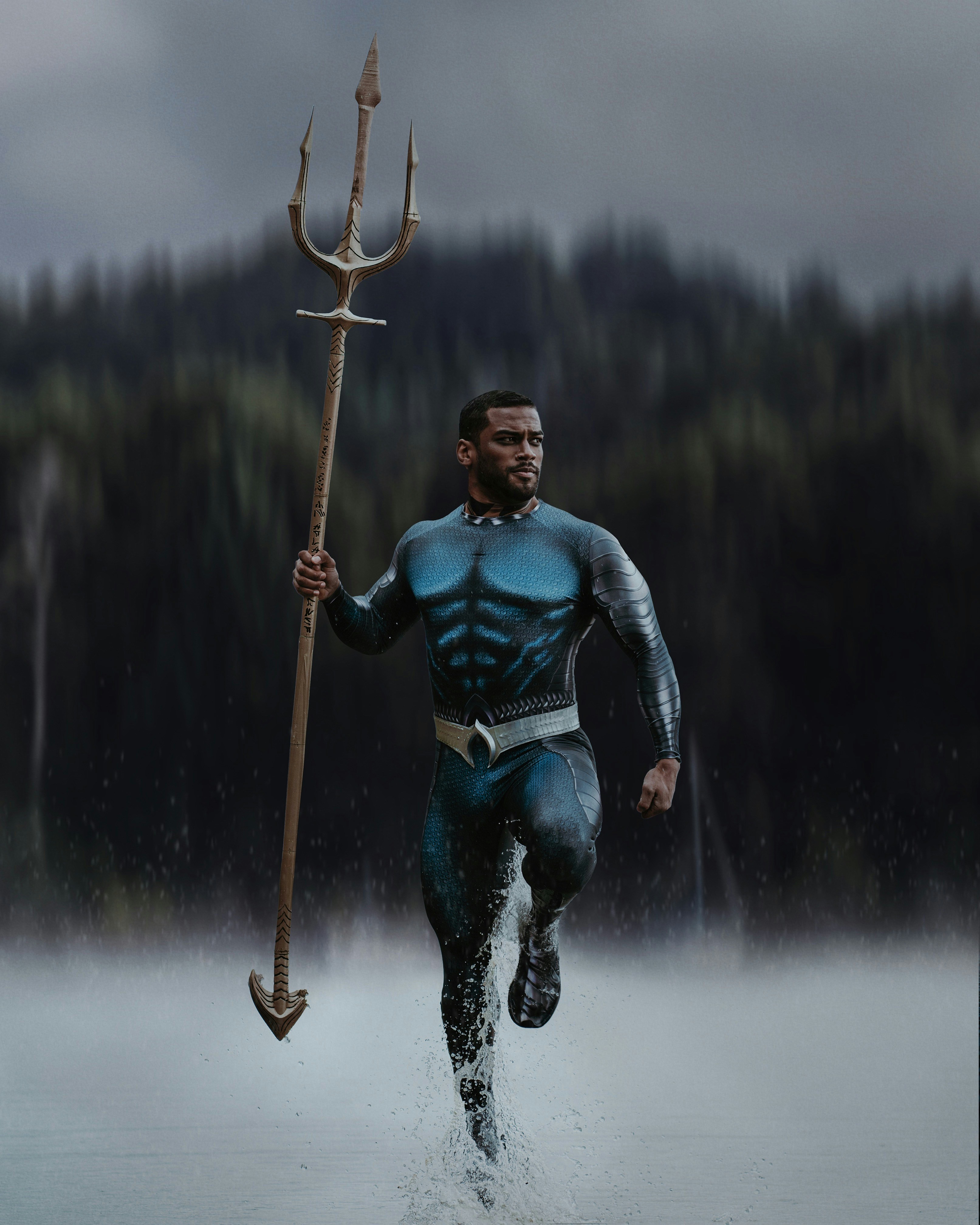 Portrait of male model Billy Dunston wearing an Aquaman costume posing in the rain. Photo by Portland Photographer Lance Reis. KickassDesigns on Insta :)