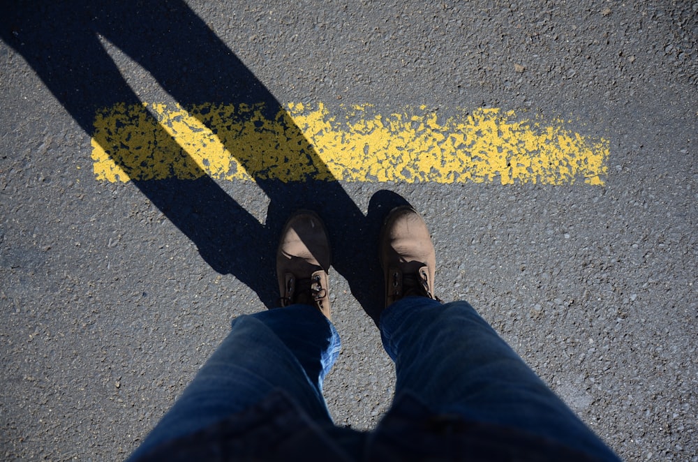 a person standing in the middle of a street