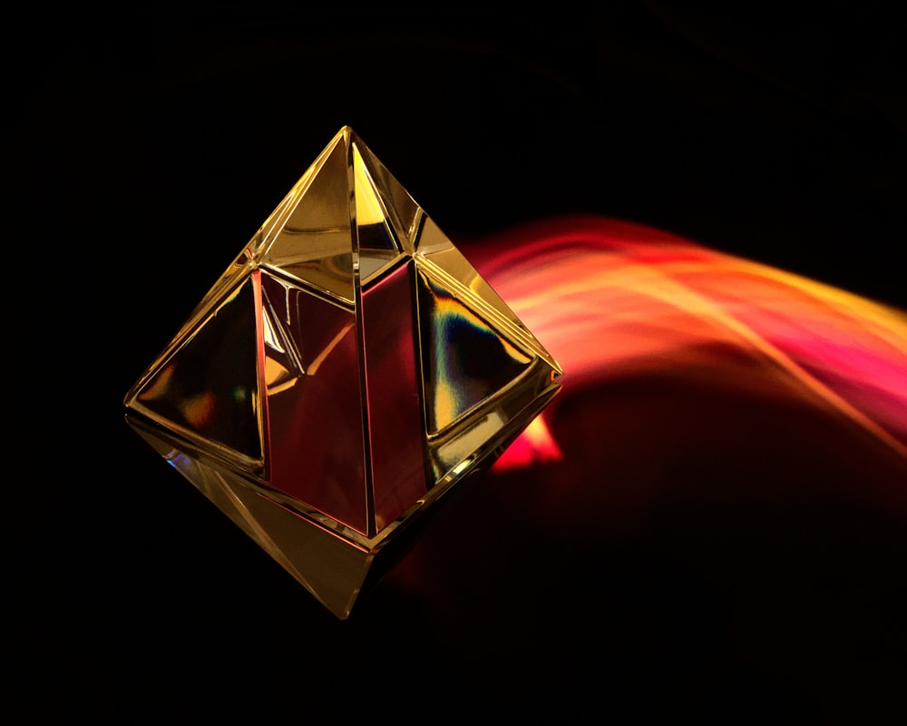 a diamond shaped object with a blurry background