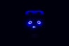 A dark background with a few illuminated blue elements that resemble eyes and a horizontal line of small dots beneath them, suggesting a robotic or technological theme.