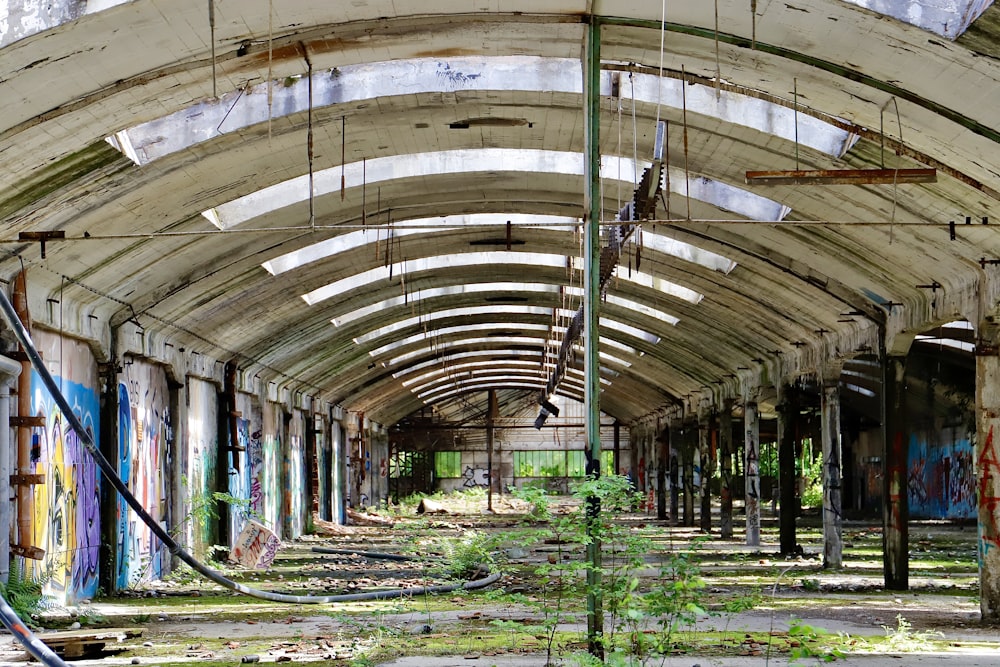 an abandoned building with graffiti all over it