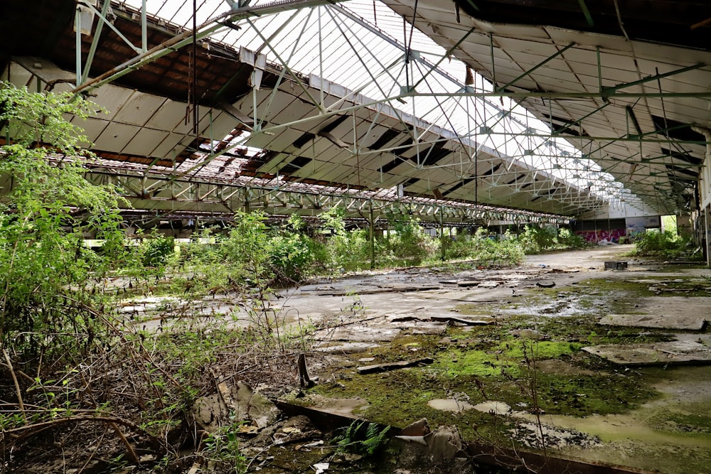 an abandoned train station with a lot of debris on the ground