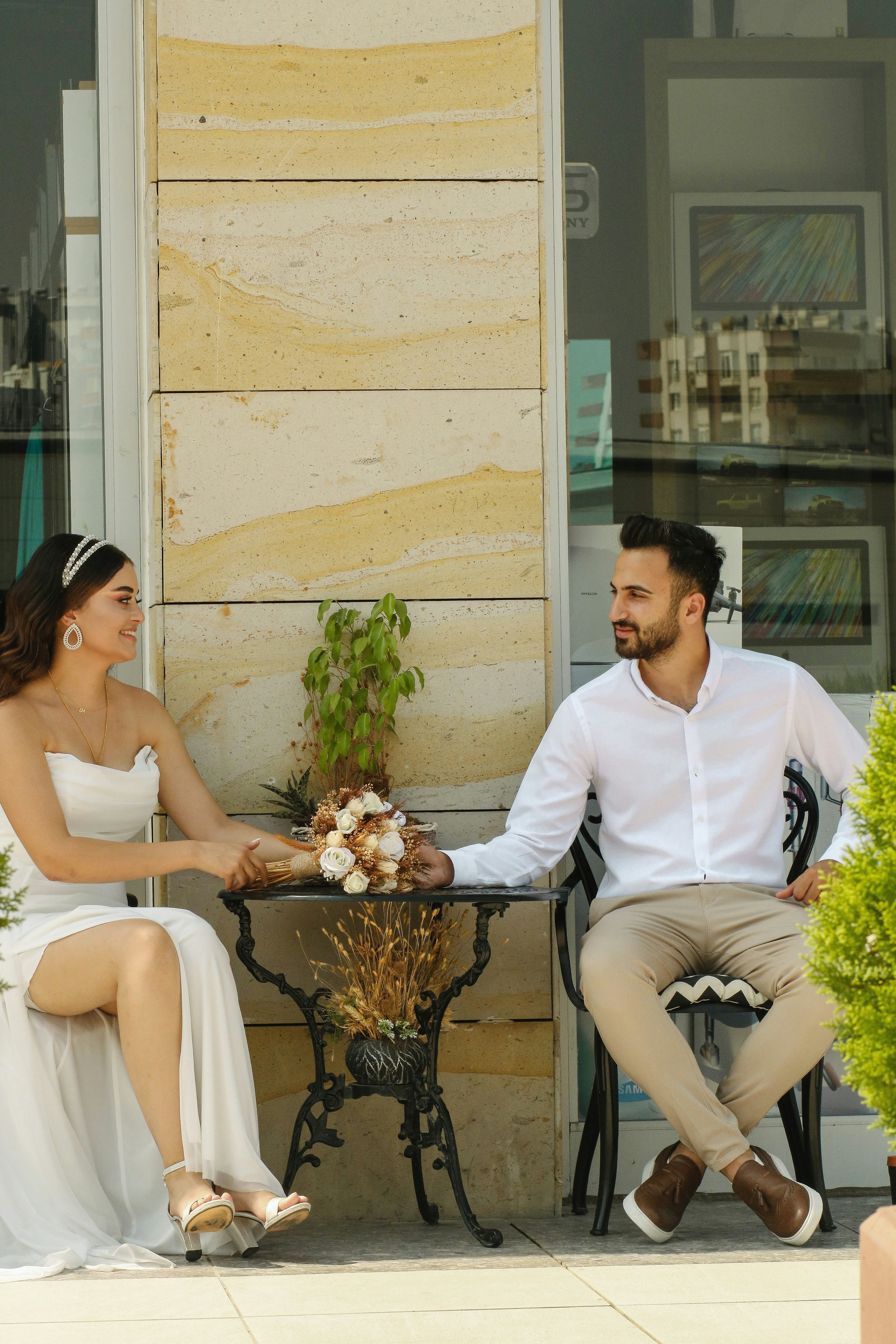 a man and a woman sitting at a table