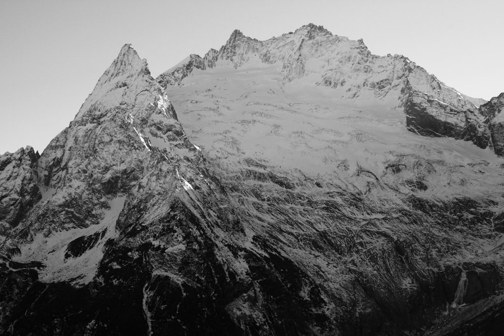 a black and white photo of the top of a mountain