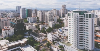 an aerial view of a city with tall buildings