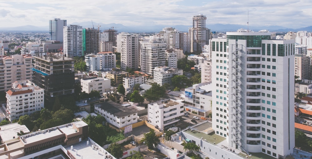 an aerial view of a city with tall buildings