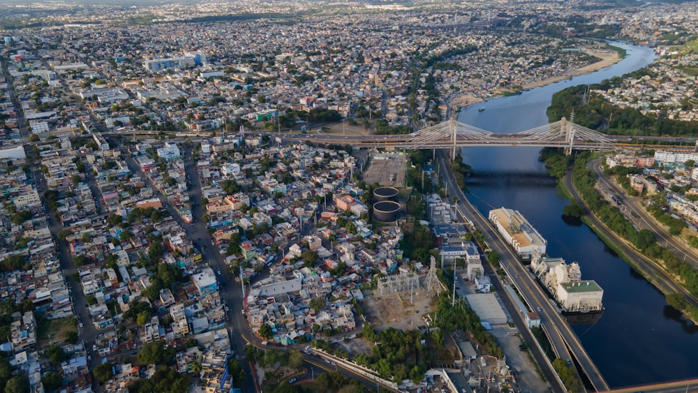 an aerial view of a city and a bridge