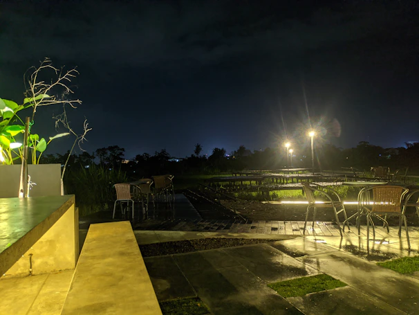 Sleek outdoor patio featuring large, natural stone tiles under soft evening light