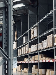 A spacious, well-lit storage facility with neatly organized storage units.