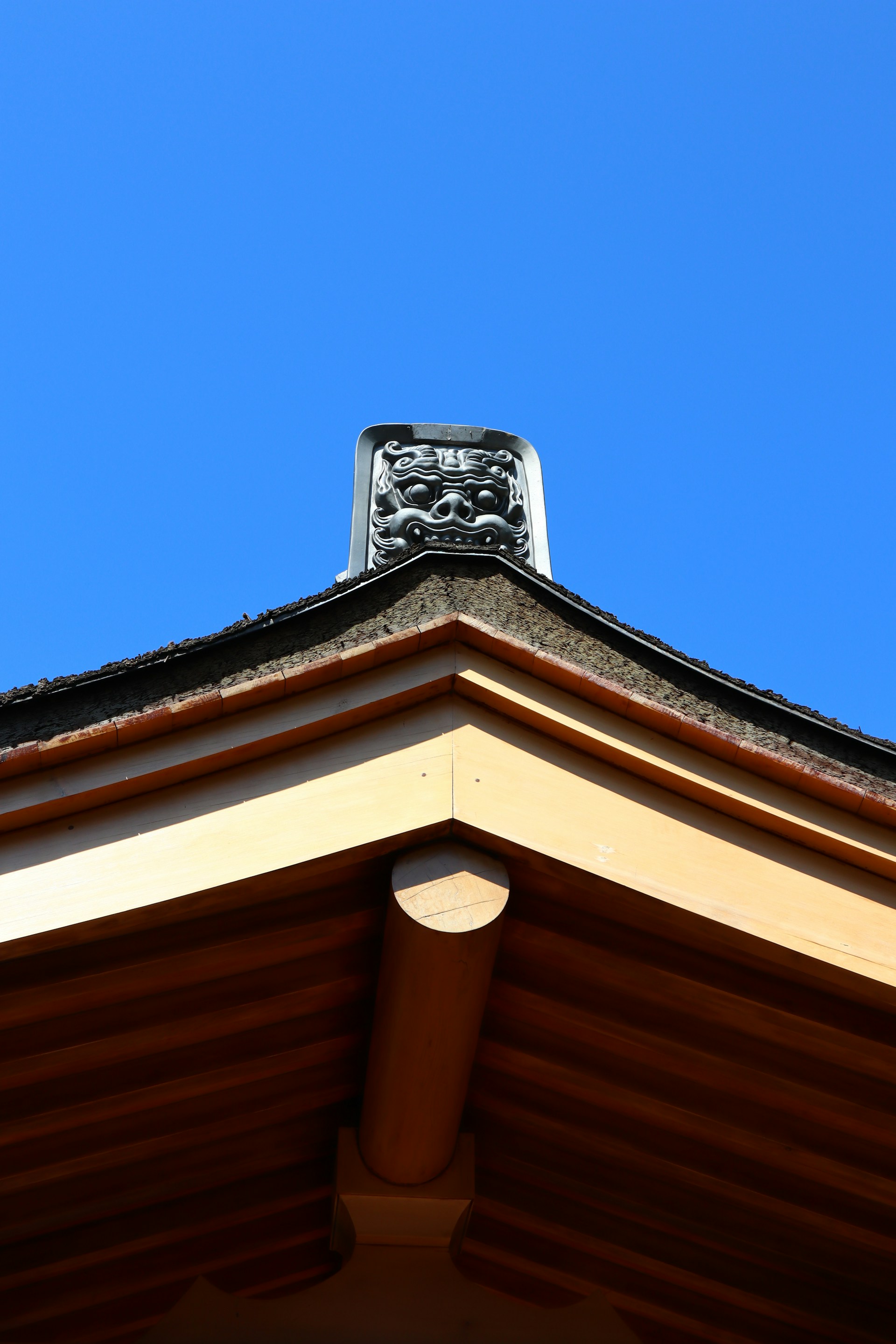 woman wearing yellow long-sleeved dress under white clouds and blue sky during daytime