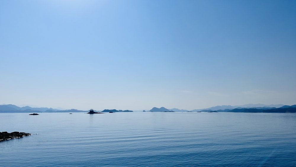 a large body of water surrounded by mountains