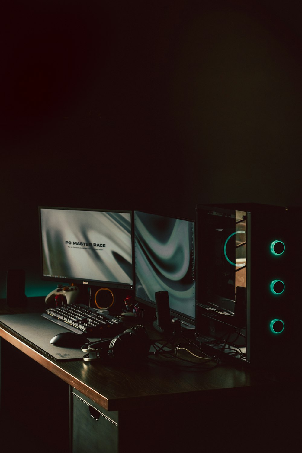 a desktop computer sitting on top of a wooden desk