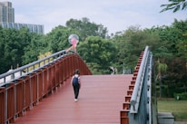 A child happily walking to school with a backpack, with a phone notification showing safe zone entry.