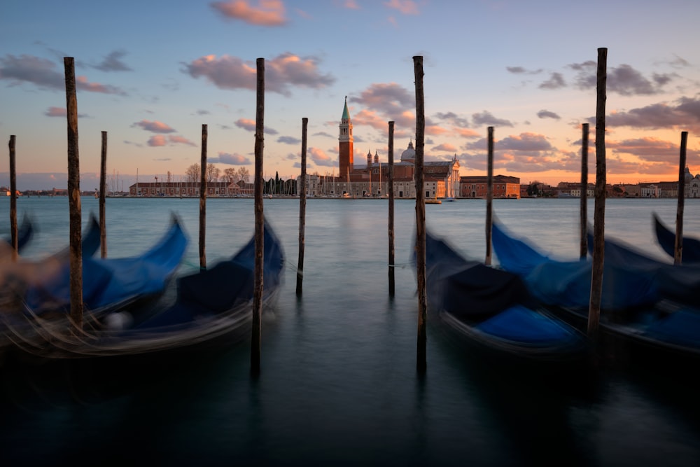 a couple of boats that are sitting in the water