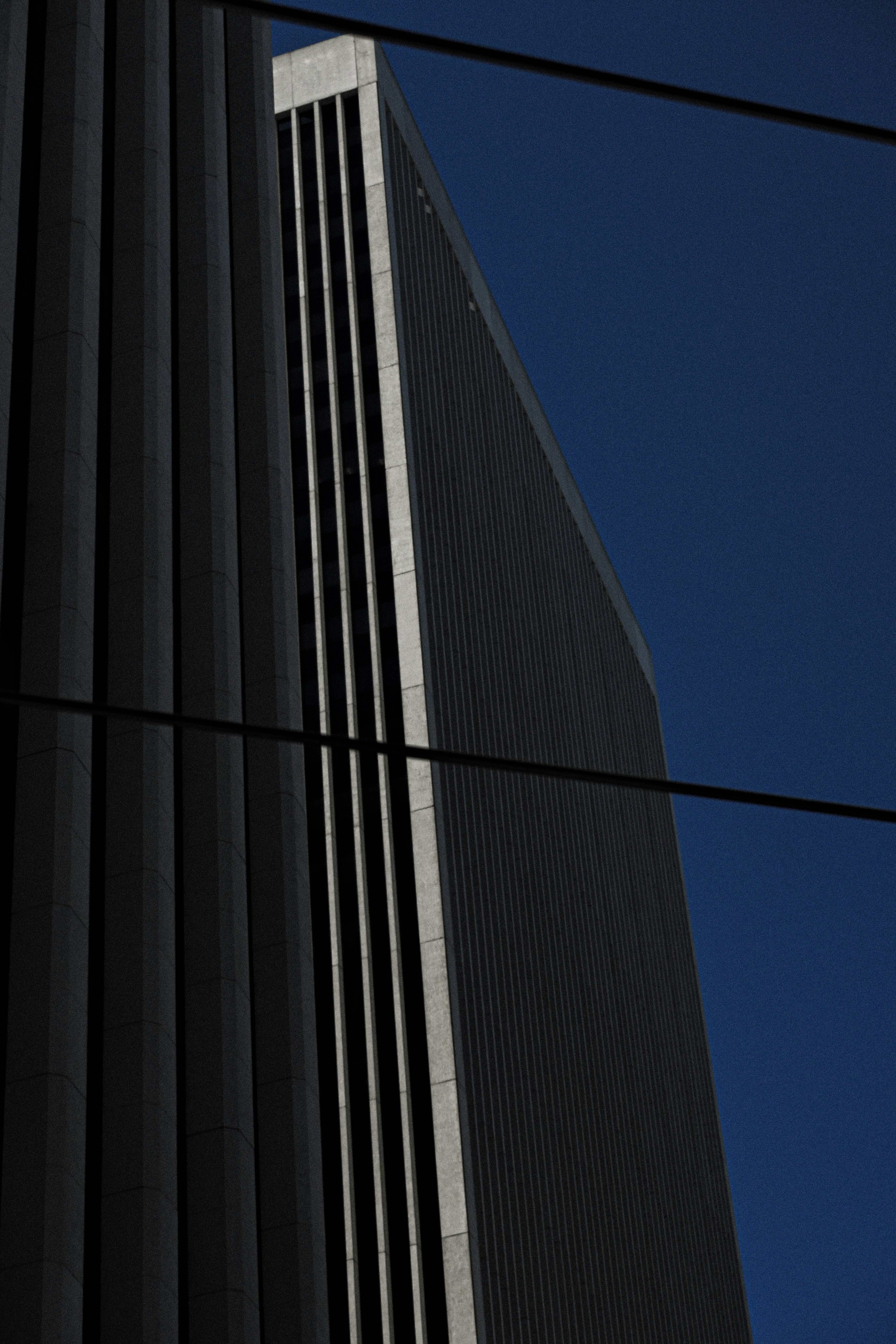 a tall building with a clock on the side of it