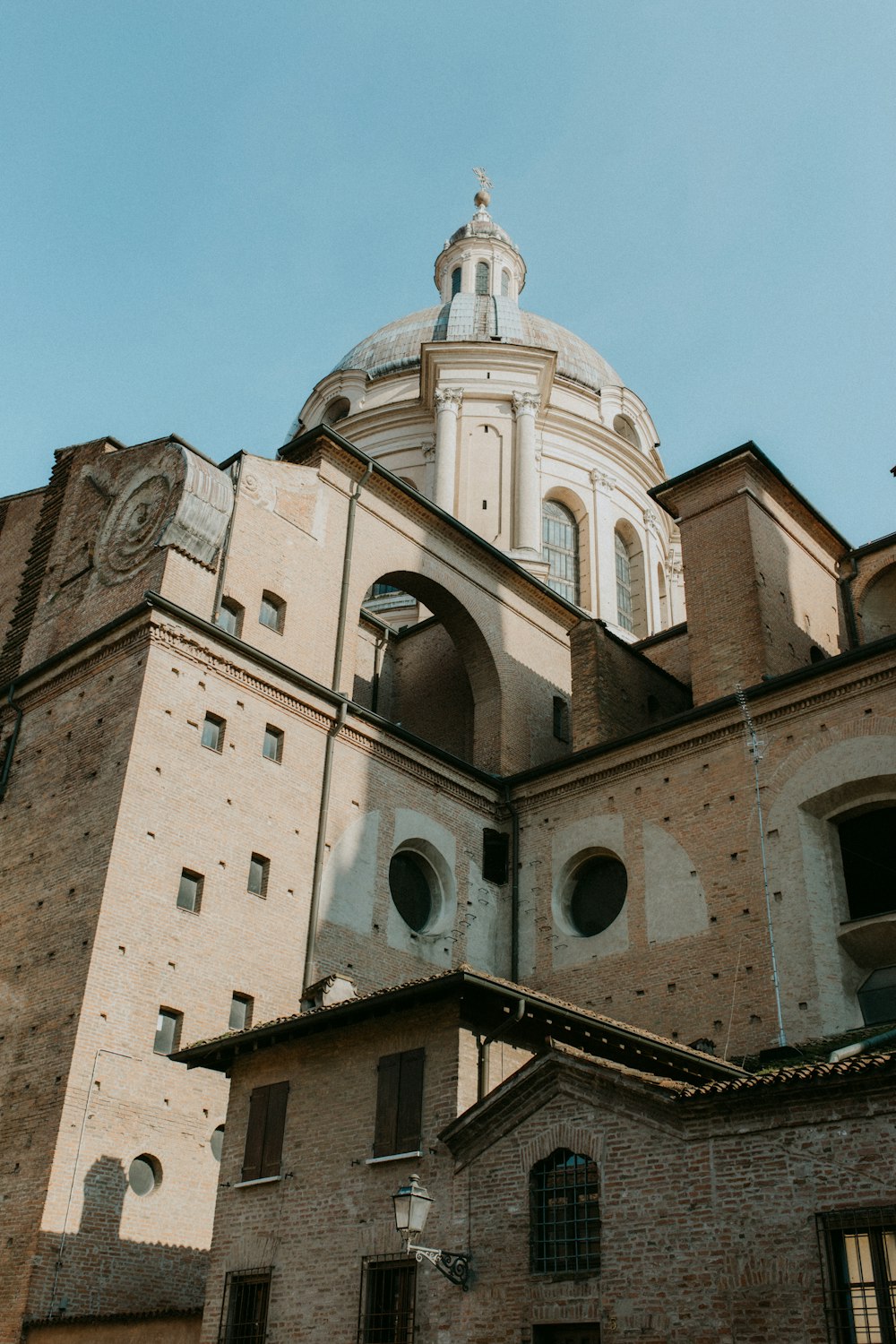 a large building with a clock on the top of it