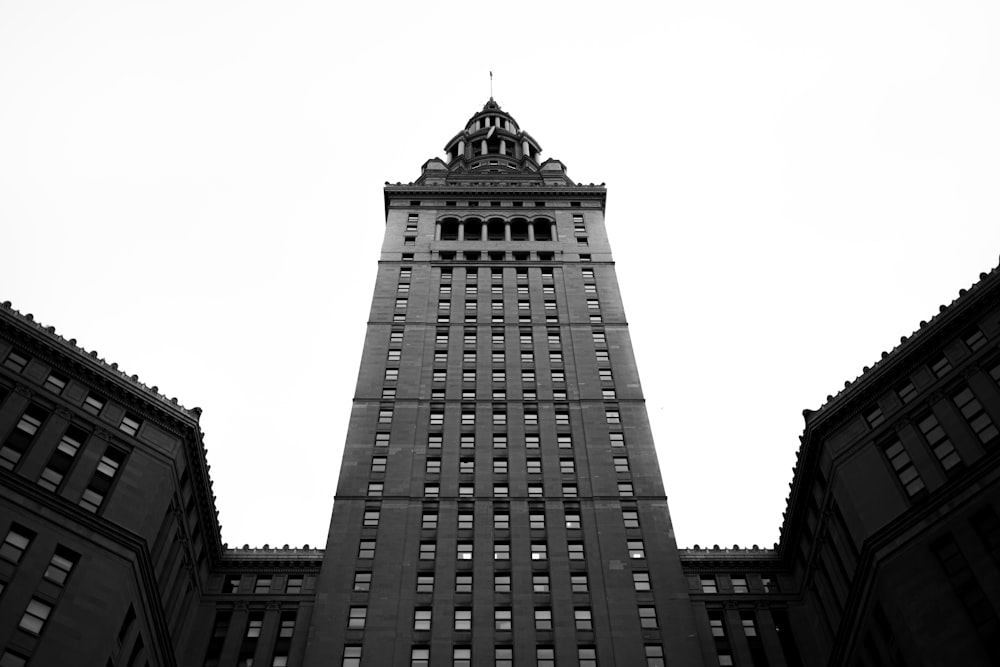 a tall building with a clock on the top of it