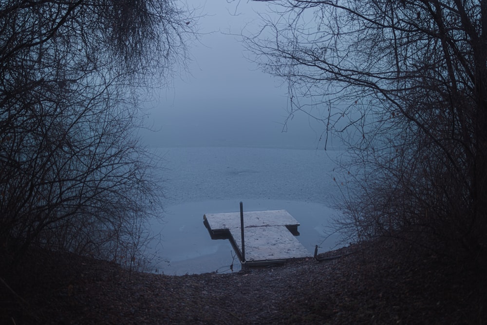 a dock in the middle of a body of water