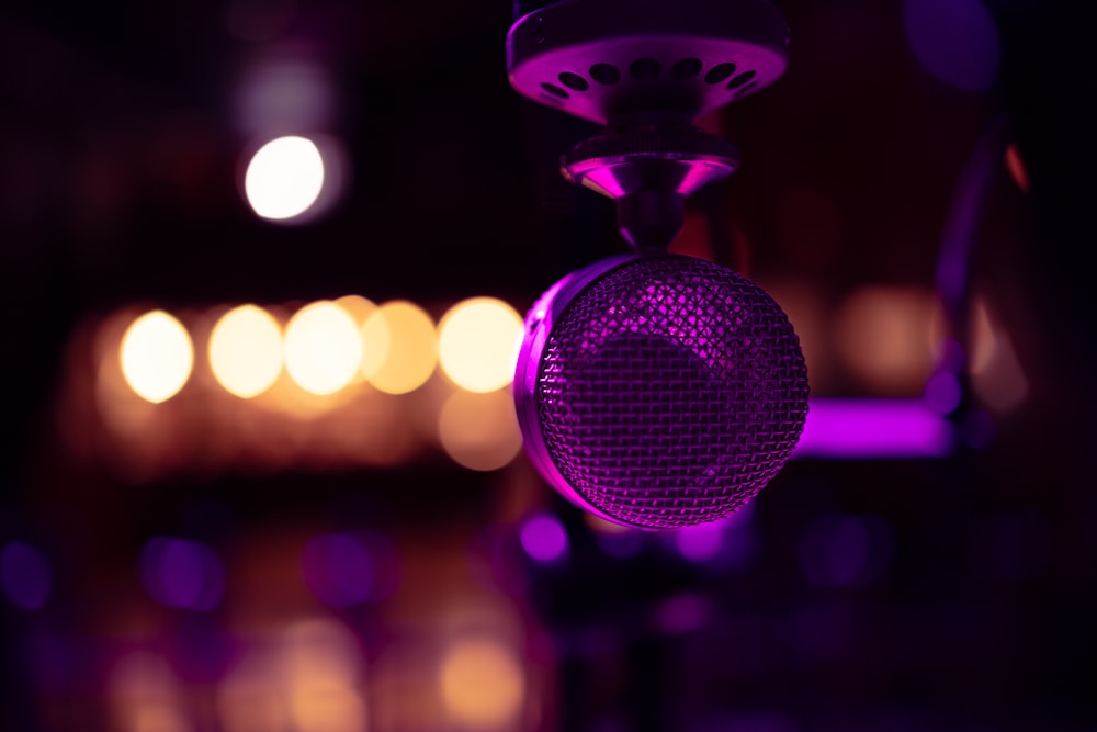 a close up of a microphone in a dark room