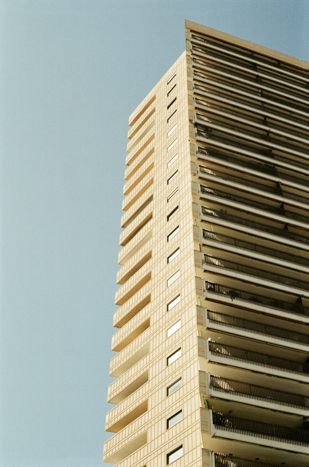 a tall building with a clock on the top of it