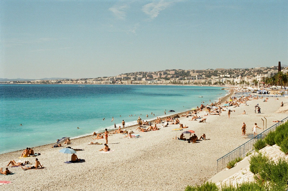 A curved city beach along a bay