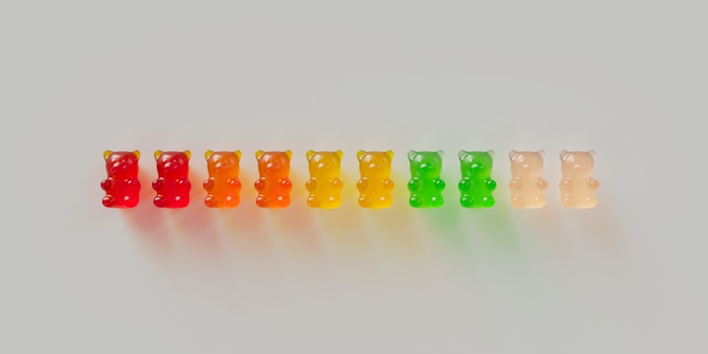 a row of gummy bears sitting next to each other