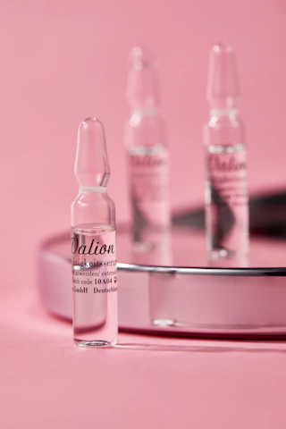 Minimalist laboratory setting with clean white surfaces and peptide vials arranged neatly.