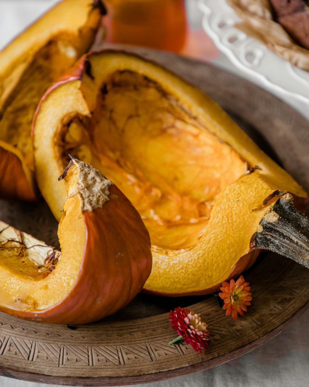 a close up of a plate of food with squash