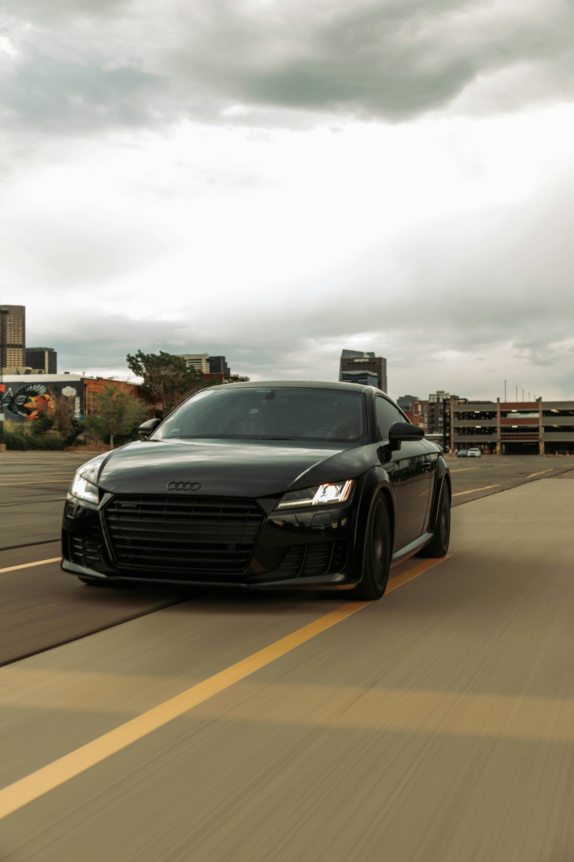black and brown leather padded tub sofa