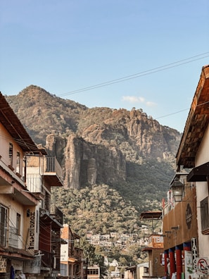 a street with a mountain in the background