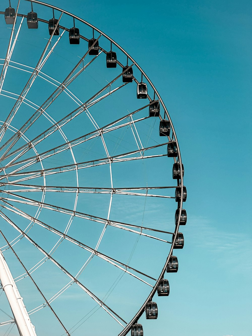 a large ferris wheel on a clear day